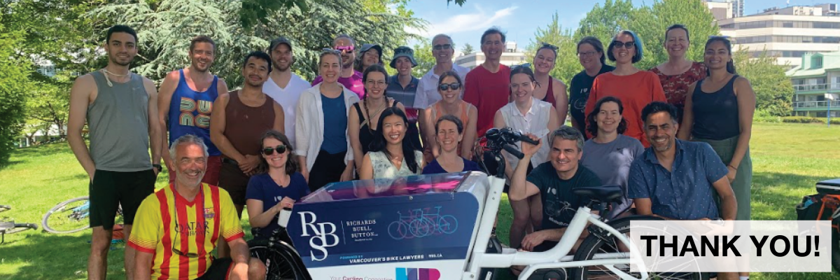 Thank You! A group photo of all of HUB Cycling's staff members at Waterfront Park in North Vancouver. HUB Cycling's e-cargo bike is also in the photo.